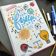 an open notebook with doodles and pens on the desk next to it is a drawing book that says risica