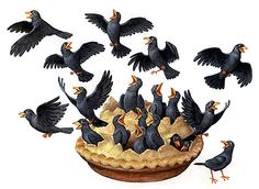 there are many black birds flying around a pie with food in it's center