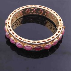 One (1) Pc Beautiful Pave Diamond With Ruby Bangle Bracelet- 925 Sterling Vermeil - Bangle With Lock - Bangle Bracelet BD047 Approx Measurement : Bangles Size: 2.25 inches inside diameter Silver Purity: 925 Metal: Sterling Silver Finish: Vermeil Stone: Ruby, 13mm Sold As: 1 Pc We are continuously adding new products in our store. So keep coming back to see more great deals on gems in our mart. Amazing quality at the best price around!!! Bulk wholesale orders are welcome on this item and any othe Festive Ruby Round Bangle, Luxury Ceremonial Gemstone Bangle, Ruby Jubilee Bracelet Bangle, Ceremonial Ruby Bangle Jewelry, Red Ruby Gemstone Bangle, Intricate Ruby Bangle Jewelry, Making Handmade Jewelry, Bangle Diamond, Ruby Bangles