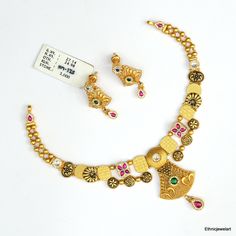 Vintage 22K Yellow Gold Choker Necklace with Earrings. Made of 22K Solid Gold and Set with Gemstones. Weight-26.050 Grams, Length-17 cm, Width-5.5 cm. Earrings-3.8 cm 22k Gold Dual-tone Jewelry For Wedding, Dual-tone 22k Gold Wedding Jewelry, Gold Dual-tone Bridal Necklace For Festive Occasions, Festive Dual-tone Gold Bridal Necklace, Bollywood Style Dual-tone Gold Jewelry Sets, Gold Dual-tone Jewelry Sets As Gift, Dual-tone 22k Gold Necklace For Weddings, Dual-tone Gold Jewelry Sets For Gifts, Gold Dual-tone Temple Jewelry Sets