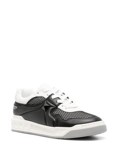 black/white panelled design mesh design leather trim logo-print tongue stud embellishment logo print to the side branded insole leather lining flat rubber sole front lace-up fastening This item is in size 42 and the color is Luxury Perforated Sneakers For Streetwear, Designer Streetwear Sneakers With Perforated Toe Box, Designer High-top Sneakers With Perforations For Streetwear, Designer Lace-up Sneakers With Perforated Toe Box, Designer Low-top Sneakers With Boost Midsole, Black Leather High-top Sneakers With Perforations, Mesh High-top Sneakers With Studded Outsoles, Custom Mesh Sneakers With Perforations And Round Toe, Designer High-top Sneakers With Studded Outsoles