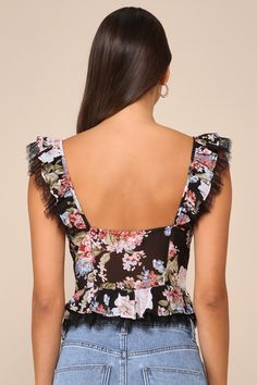 Love will always find you when you've got a romantic look like the Lulus Charmingly Sweet Black Floral Print Lace Bustier Top! Lightweight woven fabric, with a pink and blue floral print throughout, shapes this vintage-inspired top that has ruffled straps with a peekaboo of adorable eyelash lace. Bodice boasts a bustier-inspired silhouette with pleated cups and a row of hook-and-eye closures at the front. Ruffled hem boasts a matching layer of eyelash lace to complete the look. Fit: This garment Fitted Floral Print Top With Sweetheart Neckline, Floral Print Fitted Corset For Party, Fitted Floral Print Corset For Party, Fitted Floral Print Party Corset, Fitted Floral Print Feminine Corset, Fitted Floral Print Corset In Feminine Style, Chic Floral Print Corset For Summer, Chic Floral Print Summer Corset, Chic Floral Print Corset For Spring