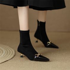 As low as $59.00 Trendy High Ankle Heels For Office, Trendy Winter Heeled Boots With Ankle Strap, High Ankle Heels For Office In Fall, Fall Office High Ankle Heels, Elegant High Heel Martin Boots For Office, Trendy High Heeled Boots With Metal Feet, Elegant Heeled Boots With Metal Feet For Fall, Elegant Winter Boots With Metal Feet, Trendy High Heel Boots With Metal Feet