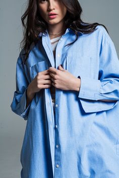 Introducing our Boyfriend Cut Shirt in a serene Baby Blue, the epitome of casual grace and comfort. This shirt is a must-have for those who love to blend effortless style with everyday practicality. Oversized Boyfriend Style: Designed to mimic the relaxed fit of a boyfriend's shirt, this piece is all about comfort and ease, offering a laid-back yet chic look. Charming 3/4 Sleeves: The 3/4 length sleeves bring a unique and stylish twist to this classic design, making it versatile for various seas Baby Blue Shirt, Boyfriend Cut, Cut Shirt, Denim Pocket, Oversized Long Sleeve, Boyfriend Style, Boyfriend Shirt, Long Sleeve Polo, Cut Shirts