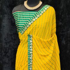 Product Detail - yellow colored casual wear saree is made from moss georgette fabric which is highlighted with beautiful stripes printed work with lace border as shown. Comes along unstitched heavy gota blouse piece which you can customise as per your design/style. Occasion - You can wear this saree for casual, outings, social meets and other homely events. Style it up - Look glamorous in this traditional saree by (HELUM FAB) Pair this saree with beautiful clutch to complete the look!! Measureme Saree With Lace Border, Traditional Saree, Wear Saree, Georgette Saree, Georgette Fabric, Lace Border, Traditional Sarees, Georgette Sarees, Blouse Piece