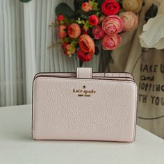 New Kate Spade Lena Medium Compact Bifold Wallet Shimmer Pink Kh787 $199 Details 3.75" H X 5.5" W X 1" D Pebbled Leather Ksny Metal Pinmount Logo Two Way Spade Jaquard Lining Interior: 8 Credit Card Slots, Id Window, 2 Slip Pockets, 1 Bill Fold Exterior: L-Zip Coin Compartment Snap Closure Dust Bag Not Included Imported Style # Kh787 Kate Spade Wallet Kate Spade New York, Affordable Elegant Kate Spade Wallets, Cheap Kate Spade Wallets With Card Slots, Kate Spade Logo, Girly Bags, Kate Spade Wallet, Pink Mini, Zip Wallet, Bifold Wallet