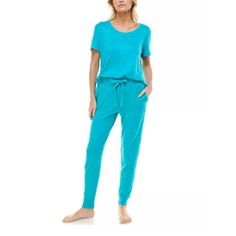 Roudelain Womens Pajamas M Blue Turquoise Soft Cozy Short Sleeve Jogger Loungewear Nwt So Soft And Cozy, Roudelain's Comfy Pajama Set Will Become Your Lounging And Sleeping Staple. Size & Fit Top: Approx. 26" Long; Shirttail Hem; Crewneck; Pullover Styling; Short Sleeves Bottom: Approx. Inseam: 29"; Pockets At Sides; Cuffed Hem; Drawstring At High-Rise Elastic Waist Materials & Care Polyester/Spandex Machine Washable Comfortable Blue Bedtime Sets, Blue Sleepwear Long Pants For Loungewear, Blue Long Pants Sleepwear For Loungewear, Blue Relaxed Fit Sleepwear For Lounging, Blue Relaxed Fit Sleepwear For Loungewear, Comfortable Blue Sleepwear With Relaxed Fit, Relaxed Fit Blue Sleepwear For Relaxation, Comfortable Blue Lounging Set, Blue Lounging Sets With Long Pants