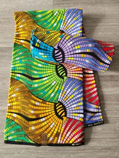 DESCRIPTION African Ankara Fabric. This is high quality African print is 100% cotton and it's 45 inches wide. It is used for making African Clothing, African quilts, & For Home decoration. FYI: Print is Double sided. The listing is for 3yards and 6yards Each piece of fabric measures: 105 - 108in by 45in for 3yards 210 - 216in by 45in for 6yards If you purchase more than one yard, you will receive one continuous piece. *If you require more than what I have listed, feel free to send me email. CARE Colorful Cotton Digital Prints, Multicolor Print Fabric, Multicolor Ankara Fabric For Traditional Styles, Traditional Multicolor Printed Art, Multicolor Cotton Fabric With Traditional Patterns, Multicolor Batik Print On Ankara Fabric, Traditional Multicolor Ankara Fabric And Notions, Traditional Multicolor Cotton Digital Prints, Traditional Ankara Fabric In Multicolor