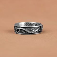 Dragon vs Koi Carp Fish Silver Band Ring, Japanes Traditional Wedding Ring, Dragon Koi Fish Gift Ring, Mythology Band Jewelry, Japanes Rings   Made of 925 silver and handcrafted by hand, this ring is not only an accessory piece that complements your daily elegance, but also has details that will reflect your character and style. It is also a great gift to give to your loved ones on their special days. At SavisSilver, we always give importance to the satisfaction of our customers, we recommend yo Collectible Dragon Design Jewelry Ring, Collectible Dragon Design Ring, Dragon Design Ring Jewelry For Gift, Dragon Design Ring Jewelry Gift, Adjustable Dragon Design Ring, Adjustable Dragon Design Jewelry Ring, Dragon Design Anniversary Ring Jewelry, Adjustable Ring With Dragon Design, Anniversary Dragon Design Ring