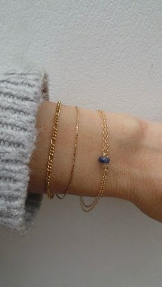 Before placing an order please check the estimated shipping times. If you need your order in a hurry shipping upgrades are available. Thank you. This little bracelet made with high quality materials makes a great gift. D E T A I L S *It features an AAA quality kyanite crystal that has been beautifully cut to make it extremely sparkly. *It is attached to delicate 14k gold filled chain that has been doubled over. *Gold filled is a wonderful alternative to solid gold and unlike gold plating does no Delicate Blue Bracelets For Everyday, Dainty Gemstone 14k Gold Filled Bracelets, Blue Dainty Birthstone Bracelets, Minimalist Blue Bracelet With Delicate Chain, Elegant Blue Bracelets With Delicate Chain, Blue 14k Gold Everyday Bracelets, Elegant Blue Bracelet With Delicate Chain, Elegant Blue Chain Bracelet For Everyday, Everyday Blue 14k Gold Bracelets