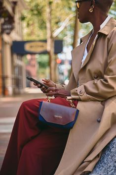 This casual bag is perfect for carrying your most essential belongings to an outdoor concert or theme park, but also works for a quick trip to the store. A sensible, yet stylish piece, the Whittle allows you to grab a phone and leather cardholder and go – without toting items unnecessary for the occasion. Each R.Riveter handbag takes a journey across the country before arriving at your doorstep. Components are crafted by independent military spouses in their homes around the nation, and shipped Trendy Phone Bag With Hidden Sleeve For On-the-go, Leather Phone Bag With Removable Pouch For On-the-go, Chic Leather Phone Bag For Everyday Use, Trendy Travel Bag With Cell Phone Pocket, Trendy Commuter Shoulder Bag With Removable Pouch, Fall Satchel Phone Bag For Everyday Use, Everyday Satchel With Mobile Phone Bag For Fall, Leather Bag With Hidden Phone Sleeve For On-the-go, Fall Everyday Use Satchel Phone Bag