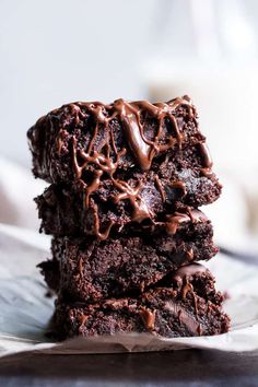 three chocolate brownies stacked on top of each other