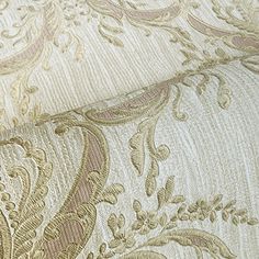 an image of a close up view of a wallpaper with gold and pink designs