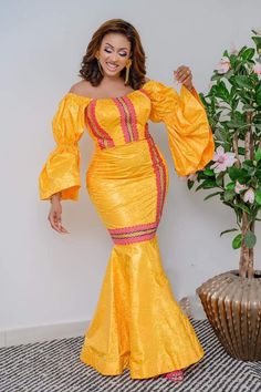 African dress made in bazin fabric. Need an exquisite African dress for your special event?  You are at the right place.  We use the highest quality bazin there is and take great care in sewing and having the dress delivered.   The dresses are custom made to your measurements.  Everything is done with customer satisfaction in mind.  We suggest that you leave us your measurements to get a better fit. But if somehow you are unable to do your own measurements, then please choose a size from the chart. You can add an optional message (size, color, or other custom) to me in the note section during checkout. Ankara Fabric Maxi Wedding Dress, Long Sleeve Ankara Fabric Party Dresses, Elegant Ankara Fabric Party Dress, Elegant Ankara Party Dress, Fitted Floor-length Dresses For Traditional Ceremonies, Traditional Ankara Fabric Dress For Wedding, Yellow Fitted Ankara Fabric Dress, Long Sleeve Ankara Maxi Dress For Parties, Fitted Long Dress For Traditional Ceremonies