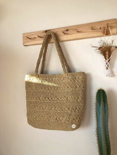 Any woman must have this bag for every fashionista.Whether you keeping it to yourself or gifting someone you care, it will be unforgettable. ✅I made this beautiful bag from straw natural paper rope which is organic cotton. ✅The bag has cotton lining. A lining of the appropriate color is sewn into the crochet paper bag. ✅ The interior of the straw summer bag has a magnetic button. Suitable for use as shoulder bag, beach bag or party bag. ✅You can combine your clothes with a straw summer bag on su Bohemian Sand Straw Bag For Everyday Use, Eco-friendly Sand Crochet Bag For Everyday Use, Handmade Jute Beach Bag For Everyday Use, Everyday Handmade Jute Beach Bag, Handmade Straw Travel Bags, Square Straw Crochet Travel Bag, Eco-friendly Crochet Bag For Daily Use In Sand Color, Sand Crochet Bag With Braided Handles For Everyday, Eco-friendly Rectangular Crochet Bag In Sand