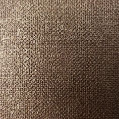 an up close view of a brown fabric texture