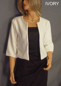 Hip length satin bolero jacket with 3/4 sleeves and scoop neck. Made from high quality bridal satin. Very flattering and comfortable fit. Great for the mother of the bride or anyone looking for a little extra coverage. VIEW PICTURES FOR SIZE AND MEASUREMENT CHART If you are needing more then four of this item just let us know. We are happy to offer VOLUME DISCOUNTS We keep several in each size in stock so that we can ship all orders out ASAP! If you need more then the quantity listed just contac Elegant 3/4 Sleeve Evening Outerwear, Elegant Evening Outerwear With 3/4 Sleeves, Elegant Satin Outerwear For Wedding, Elegant Satin Wedding Outerwear, Elegant Wedding Satin Outerwear, Elegant Fitted Solid Shrug, Elegant Fitted Outerwear For Mother Of The Bride, Formal Spring Long Sleeve Shrug, Elegant Stretch Outerwear For Spring