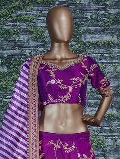 This elegantly designed bridal wedding Sabyasachi designer lehenga in dual-tone mulberry silk is further enhanced with badla, sequins, thread, and dori work all over.
Accompanied by a matching embellished Mulbury Silk choli along with matching white purple stripes printed khadi Organza dupatta which adds ease to the final look.
the lehenga and choli making it look mesmerizingly beautiful. This lehenga is semi-stitched and can be customized up to 42 sizes. Purple Chanderi Anarkali Set For Reception, Purple Silk Sharara For Navratri, Purple Chanderi Sharara For Reception, Reception Tussar Silk Choli With Traditional Drape, Purple Chanderi Sharara For Navratri, Purple Art Silk Sharara With Dori Work, Intricate Embroidery Raw Silk Lehenga, Bollywood Tussar Silk Set For Reception, Purple Silk Sets For Reception