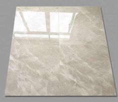 a white marble floor with a window in the middle