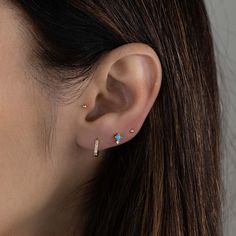 These turquoise studs are super cute and dainty! They are small, so are perfect for a minimalist look, for 2nd + piercings, or even for kids! - - - D E T A I L S - - - * Made of 925 Sterling Silver * Sold as a Pair * Measures 5 mm * Push Back Closure * Hypoallergenic and nickel free * Made of lab created turquoise, and highest grade cz stone EARRINGS ON MODEL: Huggies ---> https://www.etsy.com/listing/644599209/diamond-huggie-earrings-gold-cz-huggies?click_key=a7448a64bafe4f8689eb94a7a02fcdf4406 Minimalist Blue Birthstone Earrings, Tiny Blue Minimalist Earrings, Blue Dainty Single Earring, Blue Single Dainty Earring, Minimalist Turquoise Earrings For Everyday Wear, Minimalist Turquoise Earrings For Everyday, Everyday Turquoise Pierced Earrings, Everyday Turquoise Earrings For Pierced Ears, Dainty Turquoise Earrings For Everyday