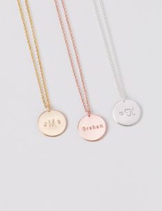 CHRISTMAS ORDER DEADLINES (WITHIN USA): Standard shipping by 12.15 Priority shipping by 12.17 Express shipping by 12.20 13mm disc necklace that can be hand-stamped on one side with your choice of initials, name, or date - endless possibilities. Modern and simple, this little piece will become a staple in your everyday jewelry collection. D E T A I L S * Disc size is approximately 13 mm * Available in 14k gold fill, sterling silver, or 14k rose gold fill * This listing is for one disc necklace P Silver Custom Name Charm Necklace, Customizable Rose Gold Charm Necklaces With Round Pendant, Personalized Minimalist Coin Pendant Necklace, Customizable Rose Gold Charm Necklace With Round Pendant, Customizable Round Rose Gold Charm Necklace, Customizable Rose Gold Round Pendant Charm Necklace, Sterling Silver Custom Name Round Charm Necklace, Personalized Sterling Silver Round Disc Name Necklace, Stamped Round Disc Charm Necklace For Gifts