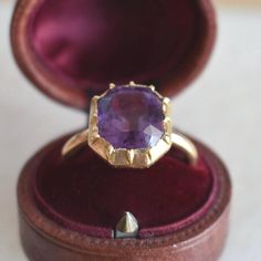 Antique ring from 1850 in 18-carat yellow gold. It features a step-cut amethyst with a deep violet hue, weighing approximately 7 carats (11 x 10 x 7 mm). This ring showcases a tubular-shaped band. Weight: 5.6 g Size: 53 FR (6.5 US - N UK) - Resizing included Metal: 18-carat Gold Stone: Amethyst Amethyst Weight: approx. 7 carats Guarantee Mark: Eagle's head (18-carat gold) Plateau: 13 x 12 mm Free Resizing & Free shipping Delivered with box & certificate You might also like: https://www.etsy.com/ Heirloom 14k Gold Solitaire Amethyst Ring, Heirloom Solitaire Purple Amethyst Ring, Gold Solitaire Amethyst Ring For Formal Occasions, Heirloom Yellow Gold Solitaire Amethyst Ring, Formal Purple Amethyst Ring In 14k Gold, Formal 14k Gold Purple Amethyst Ring, Yellow Gold Amethyst Ring With Round Cut, Heirloom Yellow Gold Amethyst Solitaire Ring, Luxury Purple Amethyst 14k Gold Ring