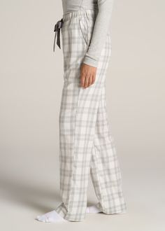 About Our Women’s Tall Flannel Pajamas You’ll never want to get out of bed when you’re wearing these women’s tall pajama pants. For years, tall women have had to settle for PJs that are way too short and fit in all the wrong places, but not anymore. You loved our classic flannel PJs and now we’re bringing you a pair with a regular fit and an open-bottom leg with all the length you need. These pajama pants have been designed exclusively for women between 5’9” and 6’6” with two different length op Cute Comfy Pjs, Plad Pajamas, Cute Pjs Pants, Women’s Pjs, College Pajamas, Flannel Pants Outfit, Pajama Pants Outfit For School, Pjama Pants, Cute Pj Pants