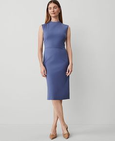 Elevate your wardrobe with the Ann Taylor Ponte Mock Neck Sheath Midi Dress, a piece that combines elegance with comfort. This dress, in a stunning Precious Sapphire shade, is tailored to flatter with its sleek mock neck and cap sleeves design. 

- Size: 4 (Regular fit)
- Color: Precious Sapphire
- Material: Shell - 66% Rayon, 30% Nylon, 4% Spandex; Lining - 100% Polyester
- Gender: Female
- Length: 25" from natural waist; hits at knee
- Features: Hidden back zipper with hook-and-eye closure, ba Interview Dress Outfit, Female Features, Petite Midi Dress, Sheath Midi Dress, Ann Taylor Petite, Midi Sheath Dress, Line Shopping, Trendy Clothes For Women, Business Attire