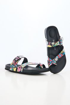 Step into comfort and style with Maibulun Thong Toe Cushioned Footbed Sandals. Designed with a cushioned footbed and thong toe, these sandals provide the perfect blend of support and style. The multi tropical prints adds a pop of color to any outfit, making these sandals a versatile addition to your wardrobe. 0.59" inch heel Slip-on / buckle closure Soft Cushioned footbed Man-made leather upper Man-made lining PU sole Tropical Prints, Reindeer Headband, Footbed Sandals, Outfit Making, Pop Of Color, Daily Dress, Dress Jewelry, Tropical Print, Accessories Necklace