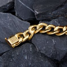 This fashionable bracelet is composed of large, semi-hollow, soft curb links. We have left this stunning piece unpolished to highlight the soft look. The bracelet is crafted in 14k yellow gold, has an Italian stamp, and is finished with a tongue closure and figure-eight safety clasp. Modern Bracelets With Chunky Cuban Link Chain, Modern Chunky Chain Cuban Link Bracelets, Elegant Chunky Cuban Link Chain Bracelet, Elegant Bracelet With Chunky Cuban Link Chain, Luxury Bracelets With Chunky Cuban Link Chain, Luxury Cuban Link Bracelet With Chunky Chain, Luxury Gold-tone Chunky Chain Bracelet, Luxury Chunky Chain Bracelet, Gold Cuban Link Necklace In 14k Solid Construction