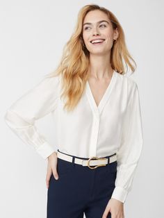 So luxe, so refined. Our silky Rinaldo blouse has a half placket shape and dress shirt cuffs for an air of elegance. | J.McLaughlin Women's Rinaldo Blouse Off White, Size XS | Cotton/Silk Classic V-neck Blouse For Daywear, Elegant V-neck Top With Cuffed Sleeves, Classic V-neck Blouse For Semi-formal Occasions, Chic Silk Business Blouse, Chic Silk Blouse For Business, Elegant V-neck Blouse For Office, Semi-formal White Silk Blouse, Elegant V-neck Top With Button Cuffs, White Silk Blouse For Semi-formal Occasions