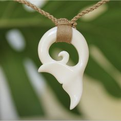 Beautifully handcrafted Buffalo bone handcrafted pendant on woven adjustable jute neck cord. Polished and detailed to bring out the best in each design. Set includes one of each Fish hook, Whale Tail and Petroglyph Honu! Individually boxed to give as gifts. Great quality and style at an affordable low price! Our buffalo bone pendants are great in and out of the water so you never have to take them off. Braided cording is adjustable so it fits from keiki to adults. Great for men and women, boys a Natural Carved Adjustable Jewelry, Natural Color Carved Adjustable Jewelry, White Necklace With Adjustable Waxed Cord, Adjustable Carved Natural Color Necklaces, Adjustable Natural Color Carved Necklaces, Artisan Jewelry With Waxed Cord For Gifts, Natural Waxed Cord Necklace As Gift, Natural Waxed Cord Necklace For Gift, Adjustable Fair Trade Jewelry For Gifts