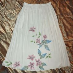 White Floral Embroidered Skirt M/L Excellent Never Worn Condition Width 15-18" Length 34" White Fitted Skirt With Floral Embroidery, Fitted White Skirt With Floral Embroidery, White Embroidered Full Skirt, White Embroidered Long Skirt, White Floral Embroidered Skirt, White Skirt With Floral Embroidery, Traditional White Embroidered Skirt, Flowy Skirt With Floral Embroidery In White, Flowy White Skirt With Floral Embroidery