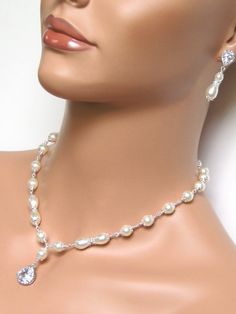 : ) Crystal Pearl Necklace With Rhinestones For Wedding, Elegant Bridal Necklace With Rhinestones For Wedding, Pearl Necklace With Diamond Accents For Wedding, Wedding Pearl Necklace With Diamond Accents, Classic Crystal Pearl Necklace For Wedding, Pearl White Rhinestone Necklace For Wedding, Classic Wedding Pearl Necklace, Silver Pearl Necklace With Rhinestones For Wedding, Elegant Pearl Necklace With Rhinestones For Wedding