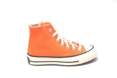 As part of their seasonal color drop, Converse offers this popping orange rendition of their Converse Chuck 70 Hi. Dipped in an eye-catching color, the high-top retro sneaker with vintage vibes offers a summery feel packed with history.   - Converse Chuck 70 Hi TotalOrng - Polyester-canvas upper - OrthoLite insole for improved cushioning - Winged tongue stitching - Rubber outsole Converse outfits the legendary Chuck Taylor All Star 70 with a series of modern upgrades, while maintaining the sneak Orange Converse, Converse Outfits, New Converse, Converse Chuck 70, Outfits With Converse, Chuck 70, Retro Sneakers, Core Values, Chuck Taylor All Star