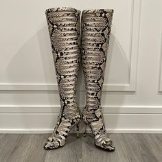 Vince Camuto Over The Knee Gladiator Peep Toe In Snakeskin Size 5.5. Okaaayy!!!! I Have Serious Size Envy Right Now! These Are Hot And So Glad They Are Back In! Low Comfortable Heel. Back Zip Ends Below/At The Knee For Zero Irritation. Plus It Just Looks So Much Better Then A Full Zip! These Are The Perfect Gladiator! Please Notethese Absolutely Can Come With The Box And Original Packaging But It’s Over Posh’s Size Limit Which Will Incur Extra Shipping Costs Which Will Be Added After Purchase. S Fitted Snip Toe Heels For Fall, Fitted Open Toe Boots With 4-inch Heel, Beige Boots With Padded Heel, Fitted Beige Boots With Padded Heel, Designer Fitted Boots With Closed Toe, Luxury Fitted Closed Toe Boots, Fitted Beige Boots With Leather Sole, Fitted Beige Heels With Leather Sole, Fitted Lace-up Heels With Leather Sole