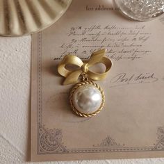 women--bestseller-bow Gold Wedding Brooches Chic Style, Gold Wedding Brooches In Chic Style, Chic Gold Wedding Brooch, Gold Chic Wedding Brooches, Chic Gold Wedding Brooches, Gold Pearl Brooches For Party, Chic Gold Brooches For Party, Vintage Pearl Gold Brooches, Vintage Gold Pearl Brooches