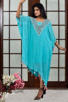 Shop for Seams Pret And Couture Blue Georgette Mirror Work Kaftan for Women Online at Aza Fashions Mirror Work Kaftan, Summer Festival Dresses With Dupatta, Summer Designer Wear Kaftan With Dabka Work, Turquoise Dresses With Resham Embroidery, Summer V-neck Dress With Mirror Work, Turquoise Dress For Festivals, Turquoise Festive Dress For Festivals, Designer Summer Kaftan With Dabka Work, Bollywood Tunic Dress With Mirror Work