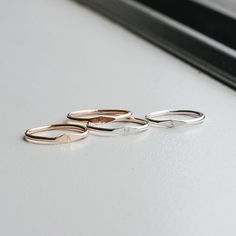 A Dainty Tiny Signet Ring, customised with a letter/initial of your choosing. The perfect ring for stacking! Each letter is hand stamped in our 1.5mm tiny block font (uppercase only). Available in sizes 2 US to 15 US Need help with sizing? Look at our size guide or purchase our ring sizer Due to its handmade nature, there may be some colour variances where the solder seam is Each Stamp + Shine piece is made from scratch in our little studio in Melbourne, Australia. The process begins with a clea Clean Metal, Block Font, Thank You Presents, How To Clean Metal, Metal Sheet, Made From Scratch, Ring Sizer, Silver Pieces, A Letter