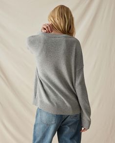 Relaxed Fit, fully fashioned cardigan sweater Soft, breathable Cotton sweater blend Knitted rib at neckline and sleeve cuffs Functional patch pockets Tonal, faux horn buttons Size Small measures 23 3/8" in front body length and 21 3/4" at chest Oversized V-neck Sweater With Ribbed Cuffs For Layering, Knit V-neck Sweater With Ribbed Collar For Fall, Casual Knit V-neck Sweater With Ribbed Collar, Fine Knit Long Sleeve V-neck Sweater For Fall, Casual V-neck Sweater With Ribbed Collar For Fall, Oversized V-neck Polo Sweater For Fall, Classic Oversized V-neck Sweater, Cozy Gray Sweater With Ribbed Cuffs, Gray V-neck Sweater For Fall Layering