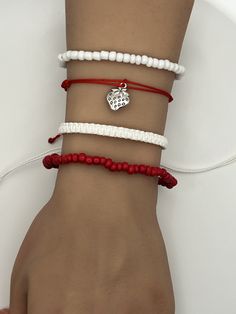 Strawberry Strawberries Charm Friendship Bracelet. Pura Vida style string, braided, woven, beaded, adjustable bracelet.  Fits most wrists and are stackable.  Perfect for everyday casual wear, activities, and special events. Can be worn individually or as a set. SIZING: White Braided Bracelet:  6 - 11 inches Beaded Red/White Bracelet:  2.36 inches CARE: Bracelets are durable, but excess pulling or yanking may cause them to break. SPECIAL NOTES: Your new bracelet may be slightly sticky/tacky for a few days.  This will not last, but may make adjusting slightly difficult for a bit. White Braided Bracelet With Adjustable Cord, Casual Braided Beaded Bracelets As Gift, Casual Braided Beaded Bracelets For Gift, White Braided Casual Jewelry, Casual White Braided Jewelry, White Braided Beaded Bracelets As Gift, Casual White Beaded Bracelets With Adjustable Cord, White Braided Adjustable Beaded Bracelets, Casual Beaded Braided Bracelets As Gift