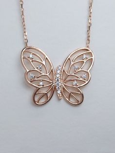 This necklace will be a nice gift for your loved ones with its meaning and style.🦋 🦋What does the butterfly icon mean? The butterfly symbolizes youth and dynamism in the Far East. In ancient Greece, it symbolizes the influence of the soul on the body and the great changes this effect creates. In ancient wisdom, the Butterfly is a direct symbol of the soul, symbolizing the freedom, lightness and grace of the soul. PRODUCT FEATURES; ✰ Weigth: 3gr ✰ Height: 44 Cm - 17.03 Inches (in video) but optional ✰Color🎨: Rose Gold ✰Pendant Height: 1 cm - 0.39 Inches ✰Material: 925 Silver * This carefully made necklace will be a display of simplicity and elegance on your neck. * All of our products are handmade and their materials are 925 sterling silver. 💎MATERİAL * 925 Sterling Silver -  Rose Gold Butterfly Shaped Rose Gold Jewelry Gift, Butterfly Shaped Rose Gold Jewelry For Gifts, Rose Gold Butterfly Jewelry Gift, Rose Gold Butterfly Jewelry For Gifts, Mother's Day Jewelry With Butterfly Charm, Mother's Day Butterfly Jewelry With Butterfly Charm, Mother's Day Butterfly Charm Jewelry, Mother's Day Butterfly Charm Pendant Necklace, Elegant Butterfly Necklace For Mother's Day