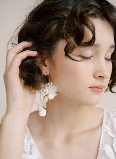 Cascading blossom, silk and pearl earring - Style #2305 White Feminine Pearl Earrings, Cream Pearl Drop Jewelry, Chic Flower Earrings For Weddings, Handmade Flower-shaped Chic Jewelry, Graceful Pearl Bridal Earrings, Elegant Cream Pearl Drop Earrings, Feminine White Pearl Earrings For Evening, Elegant Cream Earrings For Formal Occasions, White Flower-shaped Earrings With Pearl Charm