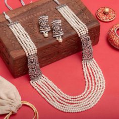 Online Desi Jewelry featuring pearl long necklace with CZ broaches on both sides. Perfect for Indian and Pakistani jewelry. Ad Necklace Set, Aqua Bag, Indian Jewelry Set, Pearl Long Necklace, Long Necklace Set, Necklace Set Indian, Traditional Indian Jewellery, Indian Jewelry Sets, Polki Jewellery