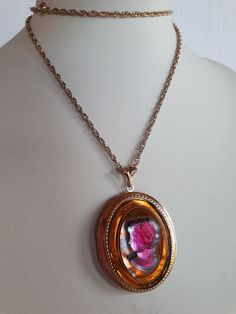 Big massive vintage gold plate with thick butterscotch and purple-cranberry pate de verre glass high relief oval cameo locket pendant necklace with chain with clasp. Note that the bust of the lady is clear glass with a lay of purple color on the top. The locket opens and can hold 2 photos. Locket without bail: 1-7/8 x 1-5/8 x 3/4 inches; chain 24 inches. Good condition with signs of wear on the back of the locket - sold as is. Thank you for watching my other items! A large collection of unique a Oval Cameo Keepsake Jewelry, Collectible Rose Gold Medallion Necklace, Rose Gold Medallion Necklace Collectible, Oval Cameo Necklace Keepsake, Oval Cameo Necklace For Keepsake, Antique Cameo Jewelry Keepsake, Cameo Medallion Locket Necklace Keepsake, Antique Cameo Jewelry For Keepsake, Cameo Medallion Locket Necklace For Keepsake