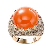 18k Yellow Gold Center Stone: Orange Cabochon Moonstone, 17.61ct Diamonds: Round Brilliant Champagne, 5.76tcw This is a one-of-a kind ring, currently available. Luxury Diamond Gemstones With Cabochon Cut, Luxury Diamond Cabochon Gemstones, Luxury Oval Cabochon Gemstones, Luxury Rings With Cabochon, Luxury Round Rings With Cabochon, Luxury Domed Gemstone Ring, Luxury Domed Cabochon Rings, Elegant Domed Moonstone Gemstone Ring, Elegant Round Orange Gemstones