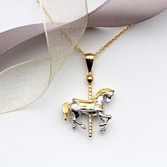 Magical and enchanting this wonderful Sterling Silver Carousel necklace is guaranteed to be jewellery to treasure. Enhanced by 18ct Gold Vermeil this necklace is popular with horse and non-horse lovers everywhere. Matching earrings available. Also available in 18ct Rose Gold Vermeil. Dimensions:  Height: 23mm Width: 19mm. Materials: 925 Sterling Silver and 18ct Gold Vermeil Carousel Necklace, Horse Carousel, Pig Necklace, Branch Necklace, Bee Necklace, Silver Coat, Horse Lovers, Vermeil Jewelry, Gold Gold