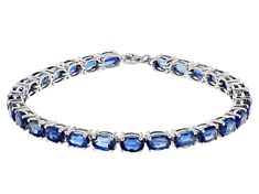 14.07ctw Oval Kyanite Rhodium Over Sterling Silver Bracelet. Measures Approximately 0.18"W. Spring Ring Closure.