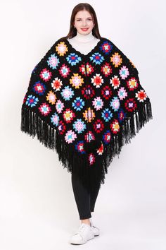 Feeling festive and fabulous in our cozy crochet poncho! ✨ This versatile piece is perfect for layering all season long. Get yours now and add some holiday cheer to your wardrobe! #christmasfashion #crochetponcho #holidaystyle #usamade Black Bohemian Poncho Shawl, Black Bohemian Shawl For Fall, Bohemian Knit Poncho With Fringe, Bohemian Knitted Shawl For Beach, Bohemian Black Poncho For Fall, Bohemian Yarn Poncho One Size, Bohemian Yarn Poncho For Fall, Spring Crochet Poncho Shawl, Bohemian Yarn Crochet Top