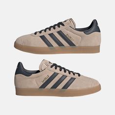 Style No. IG6199 Color: Wonder Taupe/Night Indigo/Gum Slip into a piece of the past with the adidas Gazelle shoes. These iconic low-profile sneakers were born decades ago for training indoors but quickly took over streets and sports around the world. The premium suede upper and timeless design transcend fleeting fads. A true original that helped shape sneaker culture, the Gazelle makes a bold statement in any era. adidas Gazelle Men's Shoes. Adidas Gazelle Shoes, Gazelle Shoes, Minimalistic Outfits, Sneaker Culture, Color Wonder, Gender Inclusive, Beige And Black, Casual Weekend, Adidas Gazelle Sneaker